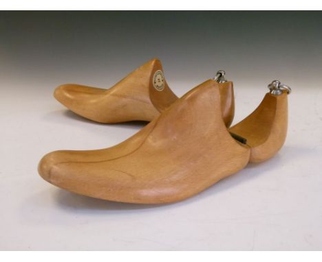 Pair of early to mid 20th Century wooden shoe lasts, Stubbs &amp; Burt Ltd, Bristol with hinged heels, 28cm long  