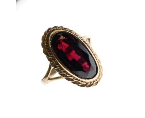 9ct gold dress ring set large faceted oval red stone, probably red garnet, size O, 3.7g gross approx  