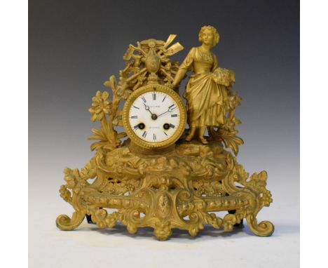 Late 19th Century gilt metal figural mantel clock with harvest gatherer, the white enamel dial inscribed 'Bridgwater', 34cm h