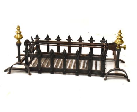Wrought iron fire grate with a pair of brass finialled dogs and a pair of tongs, the grate measuring 57cm x 35cm  