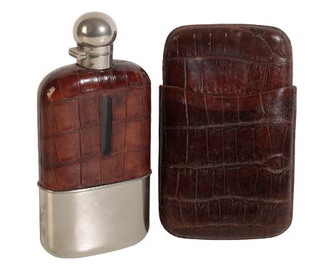 AN EDWARDIAN SILVER-PLATED AND CROCODILE HIP FLASK with crocodile cigar case (2) Provenance: A single owner collection part I