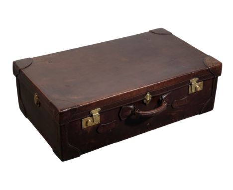 AN EDWARDIAN LARGE TRAVELLING TRUNK with brass lock fittings, 28cm x 46cmProvenance: A single owner collection part II