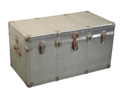AN ALUMINIUM STUDDED TRAVELLING TRUNK with leather carrying handles, 54cm x 52cmProvenance: A single owner collection part II