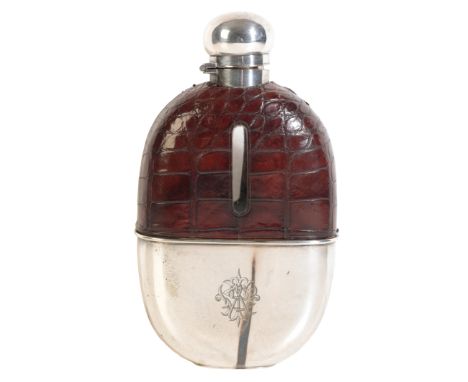 AN EDWARDIAN SILVER-PLATED AND CROCODILE HIP FLASK with flip-top, by Mappin & Webb, London and Sheffield, 16cm longProvenance