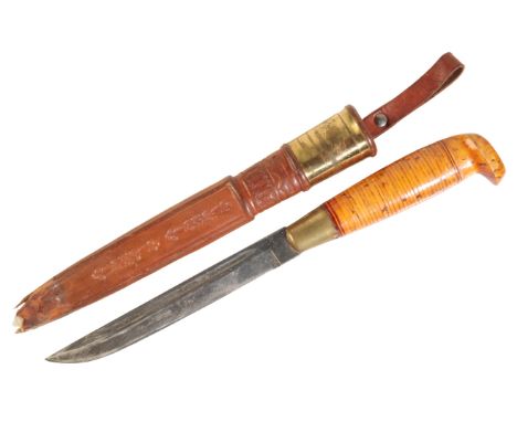 A SWEDISH HUNTING KNIFE with light walnut handle, in the original leather and brass sheath, 