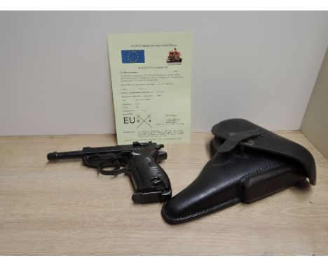 A German Walther 9mm Semi Automatic Deactivated Pistol, Serial Number 9218, barrel length 12.5cm, in leather holster, spare m