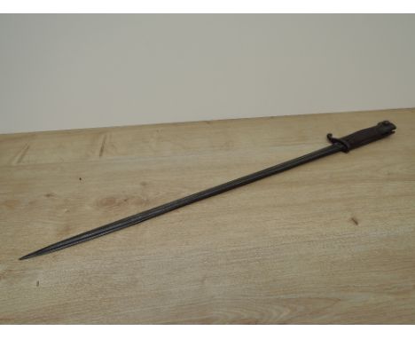 A German model 1898 Bayonet with quill point, marked on blade Alex Coppel Solingen, on guard 158R9133, no scabbard, blade len