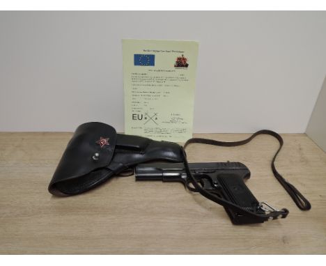 A Russian Tokarev 9mm Semi Automatic Deactivated Pistol, Serial Number 002595, barrel length 11.5cm, in leather holster with 