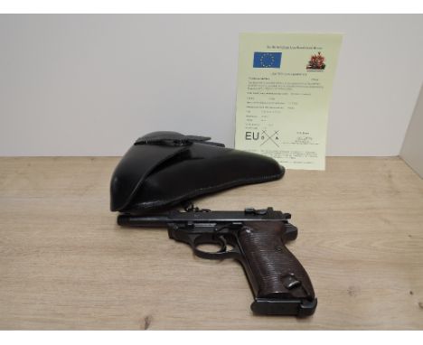 A German Walther P38 9mm Semi Automatic Deactivated Pistol, Serial Number 8570, barrel length 12cm, in leather holster marked