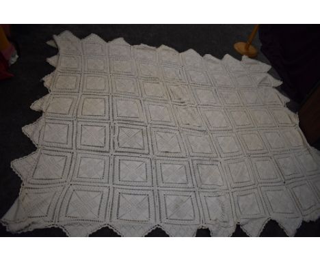 A vintage throw consisting of knitted panels with bobble like detailing.
approx 86" by 110" , a few panels have weakened stit
