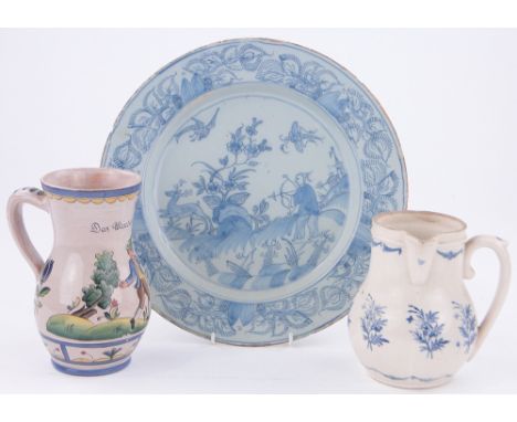 Continental tin glazed plate with hunting scene,
12", a side pouring jug and a German jug.