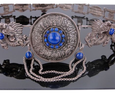 A Chinese silver belt circa 1920s,
with lapis set domed central panel flanked by relief decorated dragons, marked 925, centra