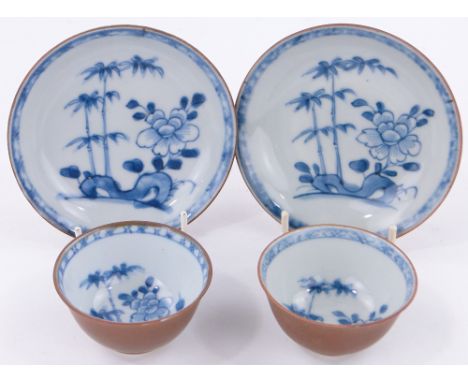 A pair of Chinese porcelain tea bowls and saucers from the Nanking Cargo,
sold at Christies.