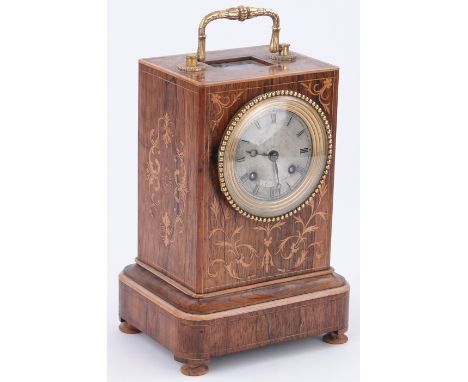 A 19th century French rosewood and inlaid mantel clock,
with foliate designs and ormolu mounts, Paris maker, height 10".