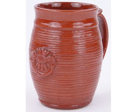 A David Leach Studio Pottery mug 
with Cornwall crest, height 5.4".