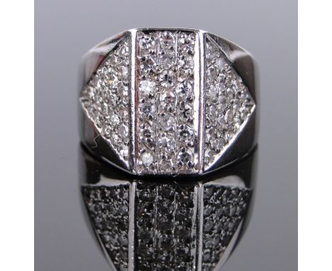 An 18ct white gold diamond set ring,
total diamond content approx. 0.75cts, panel height 14mm, size M.