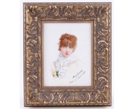 A gilt framed porcelain plaque,
with a painted portrait of Sarah Bernhardt, signed Marie Besson, height 9.75" overall.