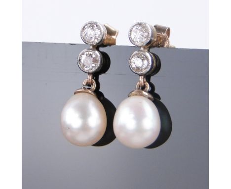 A pair of 2 stone diamond and pearl drop earrings,
unmarked gold settings, length 18mm.