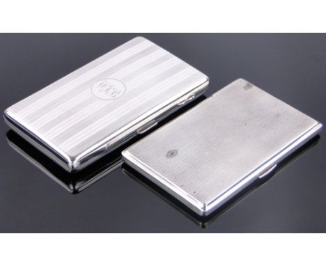 2 Engine turned silver cigarette cases.