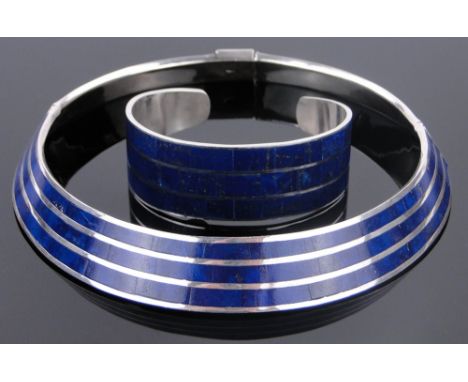 A modern silver and lapis set collar necklace and matching bangle.