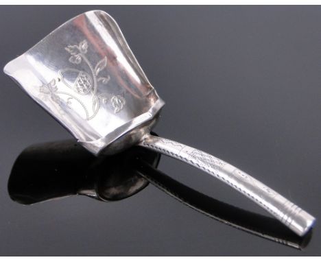 A George III bright-cut silver caddy shovel,
by John Linnit Birmingham 1810, length 8cm.