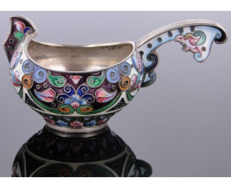 A fine quality Russian silver and champleve enamel kovsh,
 marked 84, length 8.5cm, 53g.