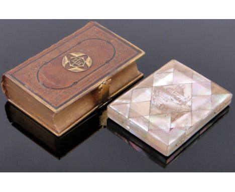 A Victorian engraved mother of pearl card case,
4" and a leather bound prayer book with gilt brass mounts, (2).