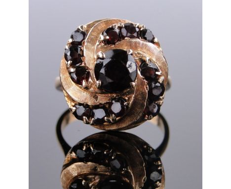 An Italian 18ct gold garnet set cluster ring,
panel height 18mm, size N.