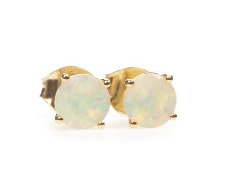 PAIR OF OPAL STUD EARRINGS, each set with a round opal 5mm in diameter, marked 9k to the posts and butterflies, 1g