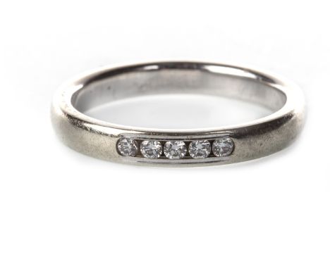 DIAMOND SET BAND, with five countersunk round brilliant cut diamonds totalling approximately 0.18 carats overall, marked 14k,