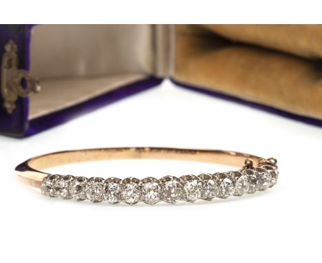 IMPRESSIVE OLD CUT DIAMOND BANGLE, the old cut diamonds totalling very approximately 4.50 carats, 55mm inner diameter, rose c