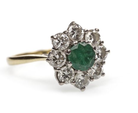 GREEN GEM SET AND DIAMOND RING, the round green gem surrounded by round brilliant cut diamonds totalling approximately 0.80 c