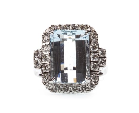 AQUAMARINE AND DIAMOND RING, the step cut aquamarine bordered by round brilliant cut diamonds totalling approximately 0.92 ca