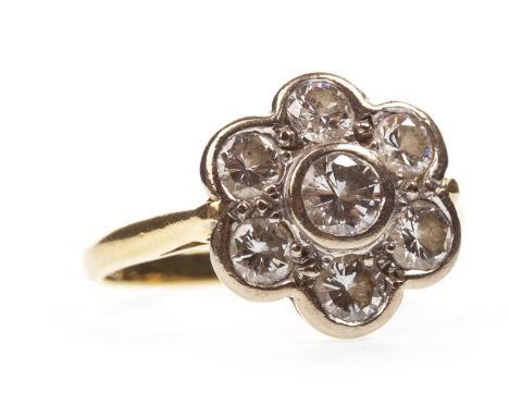 DIAMOND CLUSTER RING, the bezel in the form of a daisy cluster, with collet set round brilliant cut diamonds totalling approx