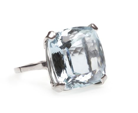 BLUE GEM SET RING, set with a cushion shaped blue gem 16x16mm, unmarked, size L 1/2, 8.3g