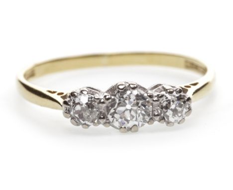 DIAMOND THREE STONE RING, the old cut diamonds totalling approximately 0.60 carats, marked 18ct gold, size U, 2.7g