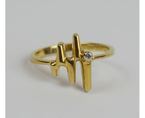 Ring mit kleinem Diamant, 333er Gold, Gew.2,35g zapfenförmiger Ringkopf mit seitl.Diamant, U.58