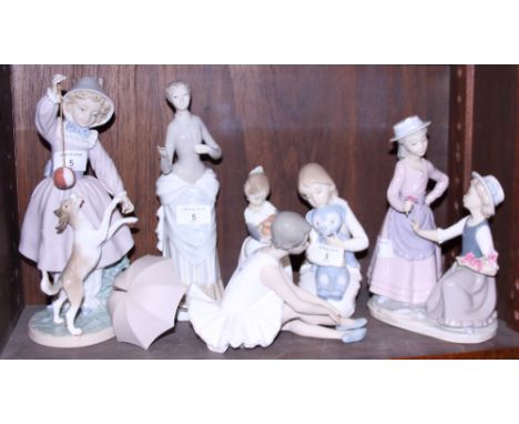 A Lladro figure of a girl playing with a dog and ball, a girl with a basket of fruit, a Nao ballerina, and three other Nao fi