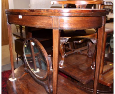 A 19th century mahogany and line inlaid demi-lune fold-over card table, on square tapered supports, 36 1/2" wide