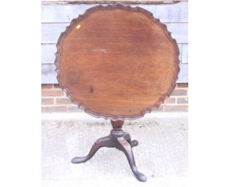 A George III mahogany tip top occasional table, on baluster stem and tripod base, 31" diacondition: split to table top base a