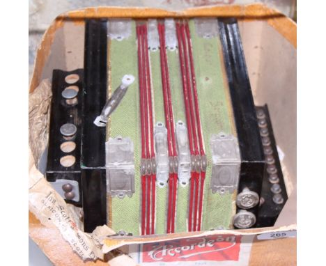 An early 20th century Sargent of Germany accordion, complete with box
