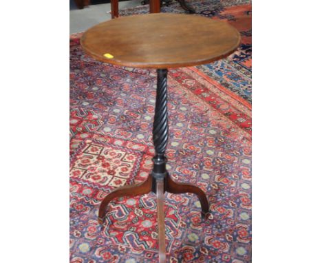 A 19th century wine table with oval oak top, on ebonised spiral fluted column and tripod base, 16" x 14"