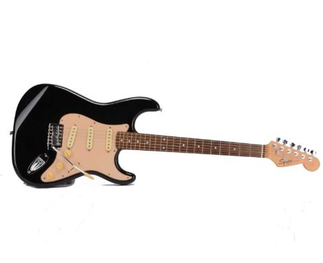 Squier Strat, Squier Strat by Fender black with tremolo arm good condition with some very light scratches comes with a qualit