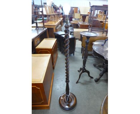 An oak barleytwist standard lamp 