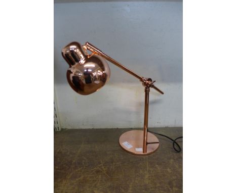A copper effect anglepoise lamp 