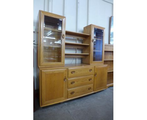 An Ercol Blonde elm and beech dresser