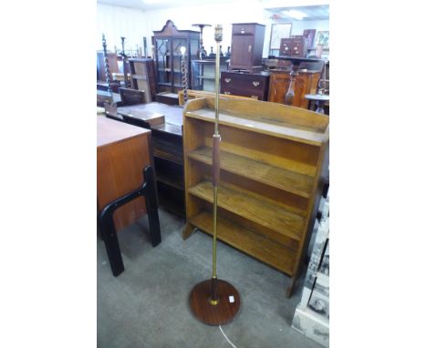 A teak standard lamp 