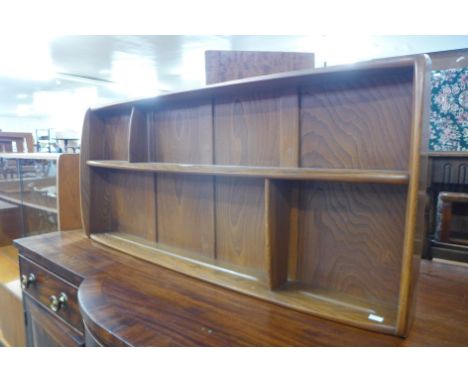 A set of Ercol elm and beech wall hanging shelves 