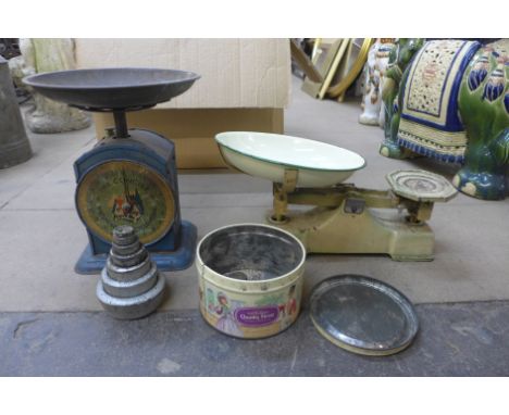 A set of kitchen scales and weights and one other with 'The Concise Household Encyclopedia' advertising scale front 