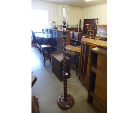 An oak barleytwist standard lamp 